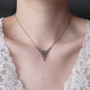 V-shaped chain mail necklace with a small silver chain